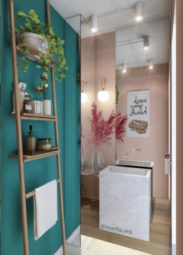 O poder das cores nos ambientes, lavabo com uma parede pintada na cor verde turquesa e parede de fundo espelhada