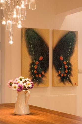 Quadro díptico de borboleta, decora a sala de jantar .