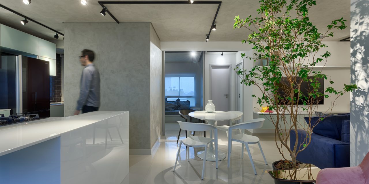 Junior Piacesi assina apartamento minimalista, industrial e contemporâneo