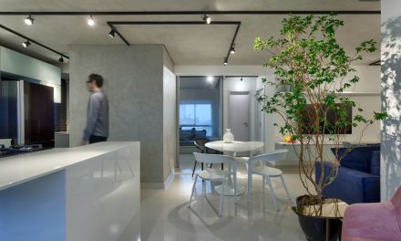 Junior Piacesi assina apartamento minimalista, industrial e contemporâneo