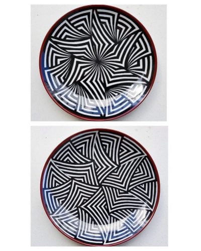 Pratos de porcelana pintados a mão, grafismo preto e branco