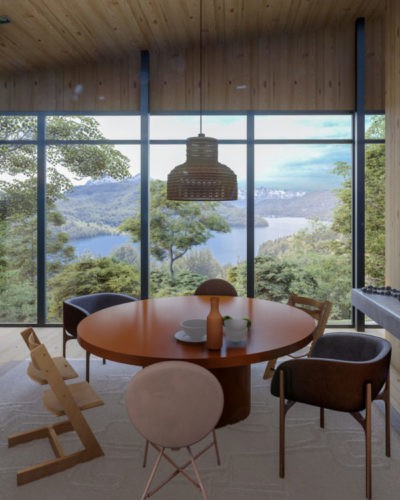 Imagem 3d de uma sala de jantar com mesa marrom redonda, janelas do piso aoteto com uma vista para montanhas e um lago