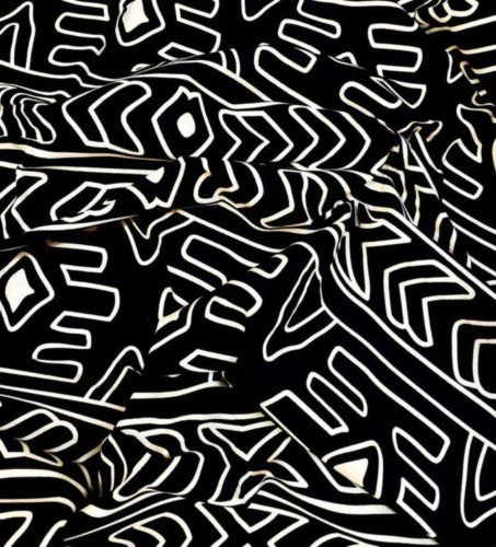 Padronagem do continente africano, das Casa das Kapulanas, uma especialista em tecidos africanos. Fundo preto com traças em branco.