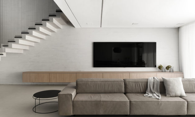 Estilo minimalista e atemporal, com décor em branco, preto, tons de cinza e madeiras