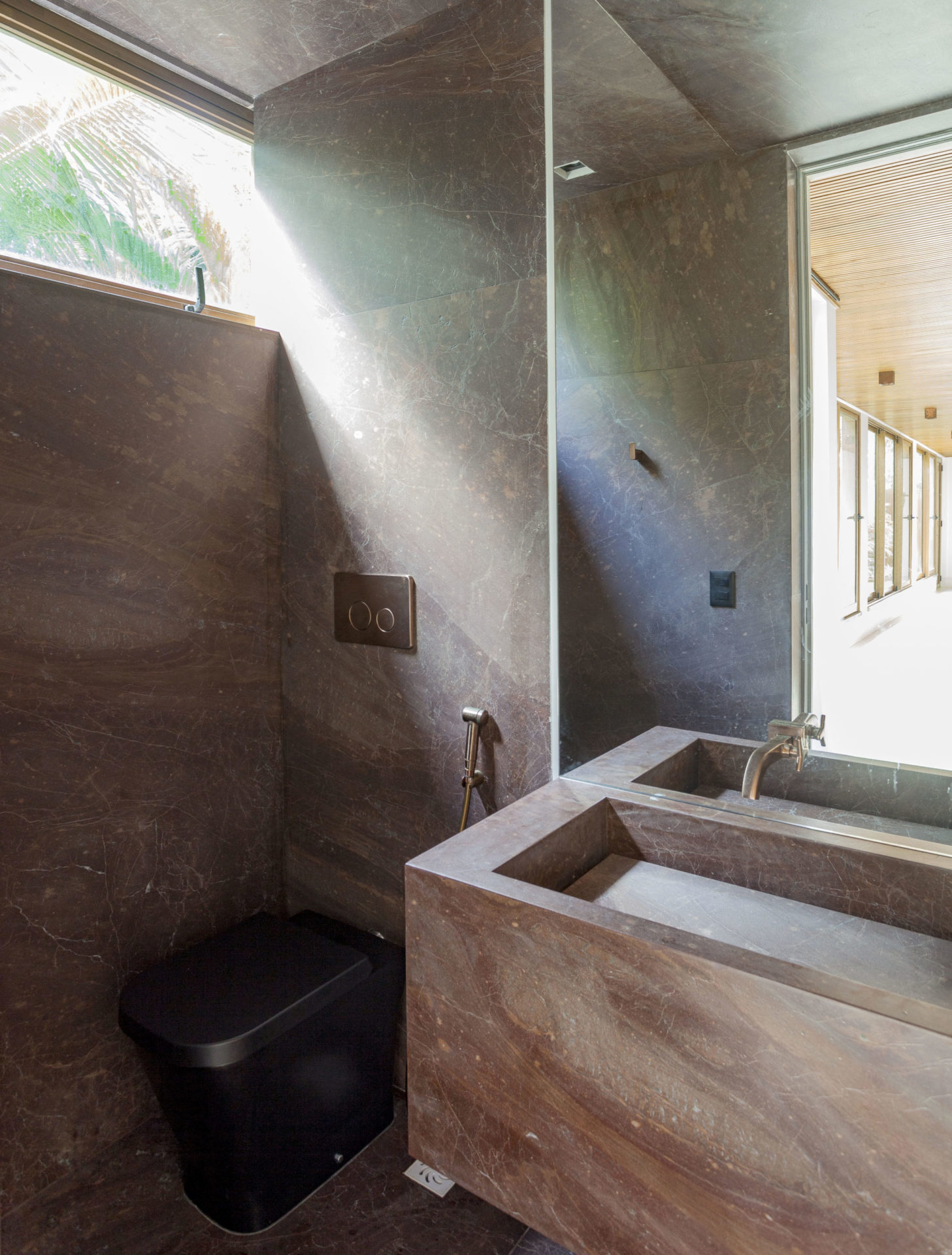 na foto banheiro de suíte de casa de praia