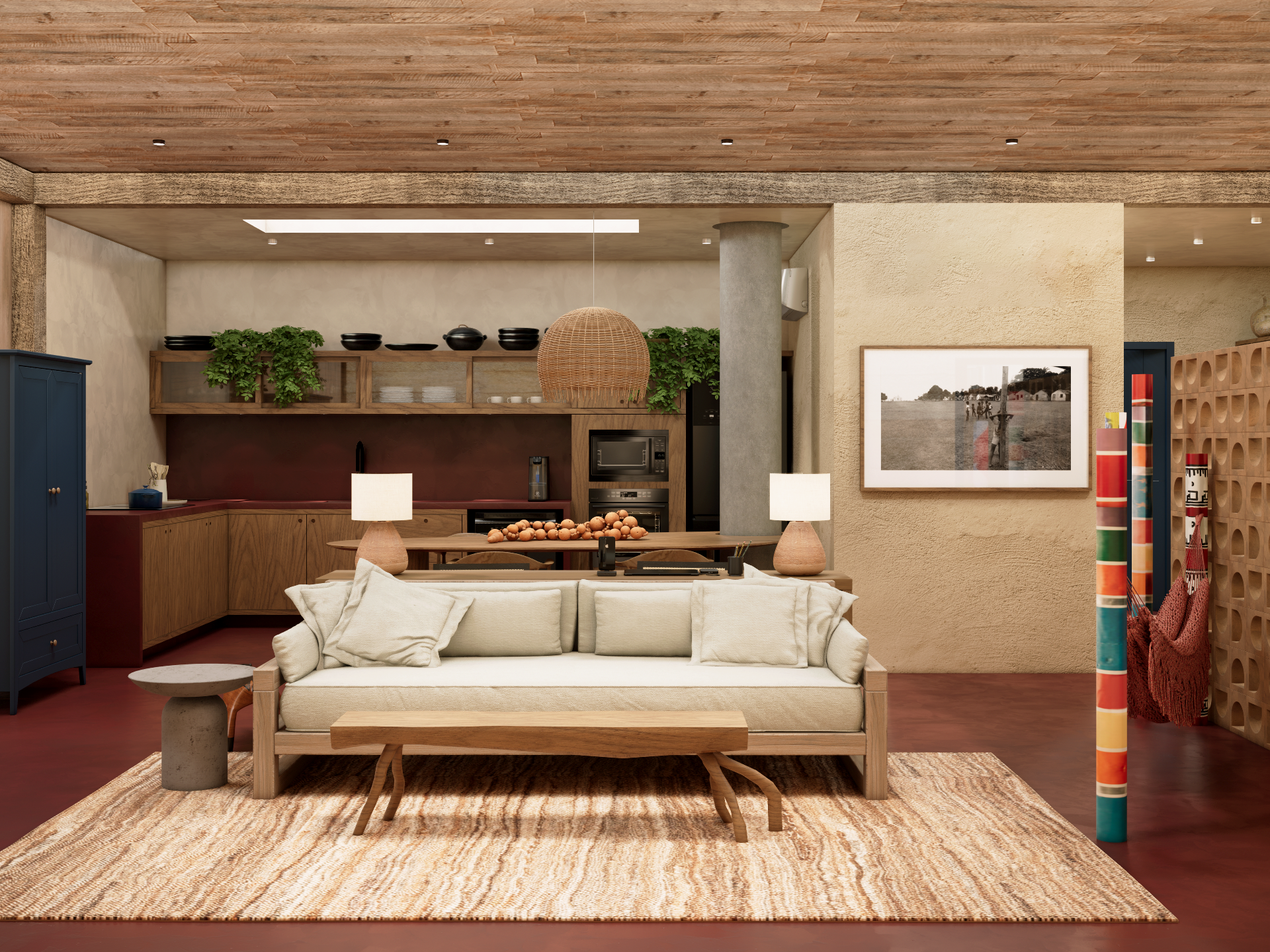 na foto cômodo com sofá e cozinha ao fundo